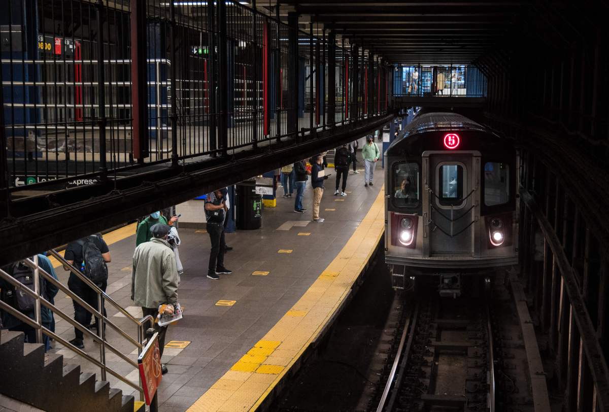 Police Arrest Man with Wooden Plank for Assault and Pushing Victim onto Manhattan Train Tracks