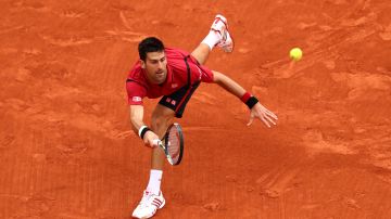 Novak Djokovic consigue el último punto que lo acreditó como campeón del Roland Garros 2016 ante Andy Murray.