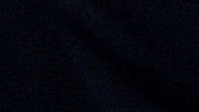 Bad Bunny y Kendall Jenner disfrutando de un evento deportivo.