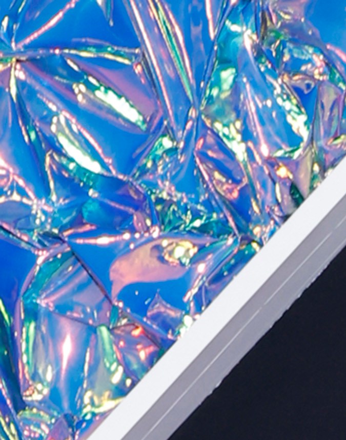 Sean Combs posando en una alfombra roja.