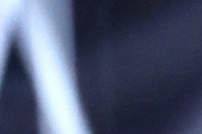 Peso Pluma actuando en un show en vivo.