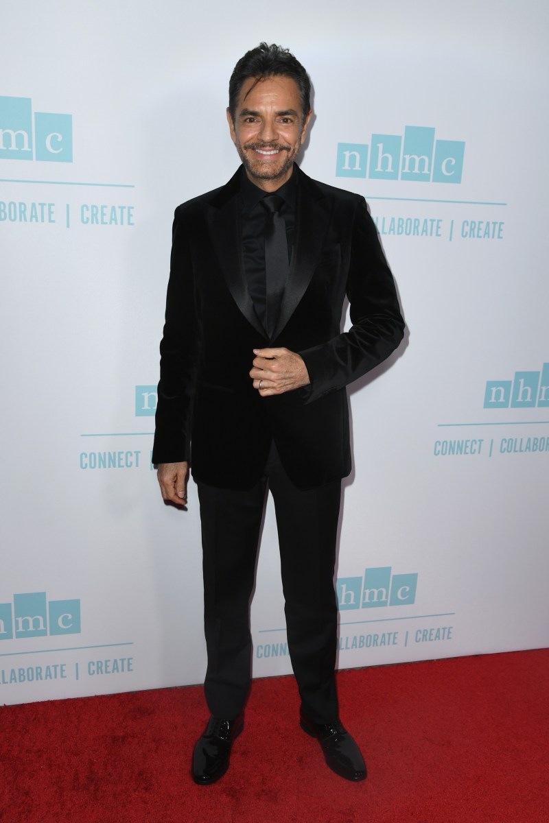 Eugenio Derbez posing on a red carpet.