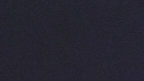 Shakira posando en una alfombra roja.