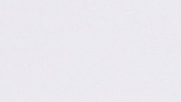 Bruce Willis posando en una alfombra roja.