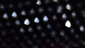 Margot Robbie y Greta Gerwig posando en una alfombra roja.