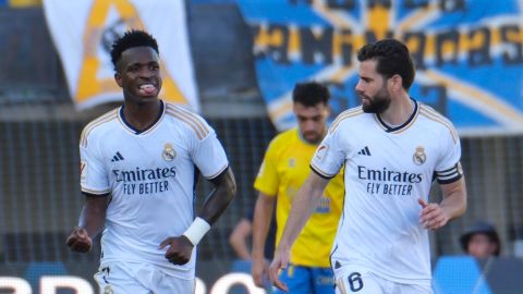 El delantero brasileño del Real Madrid Vinícius Júnior (i) celebra tras marcar el 1-1.