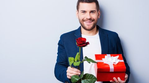 Romantic,Man.,Handsome,Young,Man,Giving,A,Gift,And,A