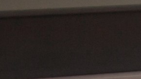 Portrait,Of,A,Young,Hispanic,Woman,Sitting,In,Front,Of