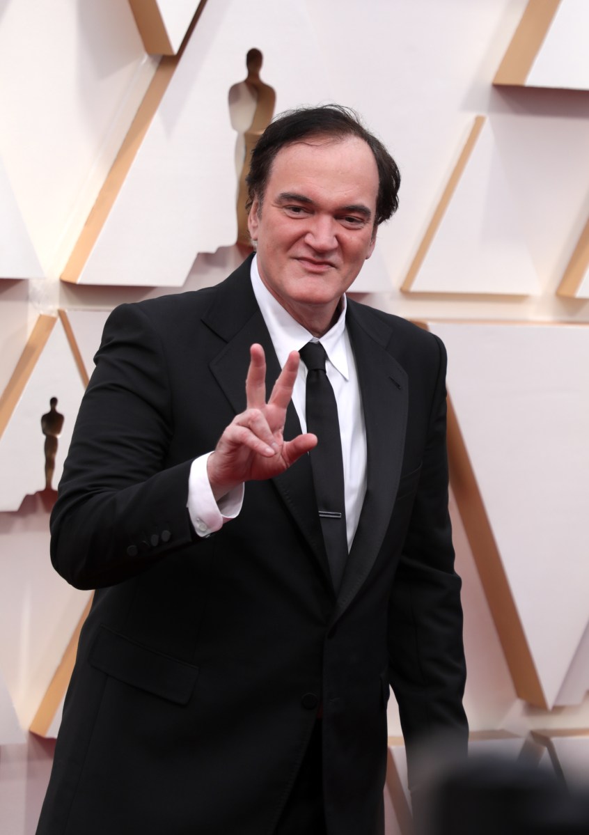 Quentin Tarantino posando en una alfombra roja.