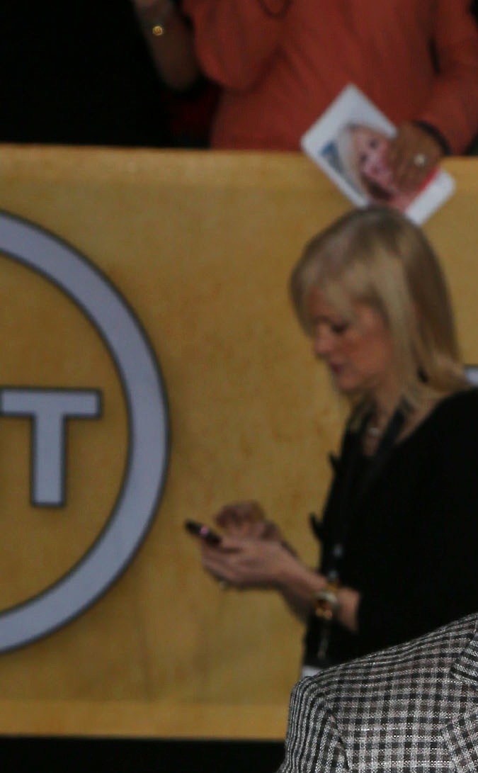 Justin Timberlake posando en una alfombra roja.