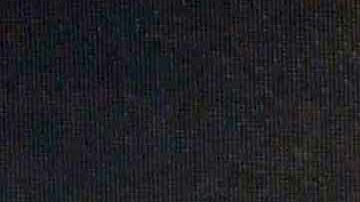 Melissa Barrera posando en un evento.