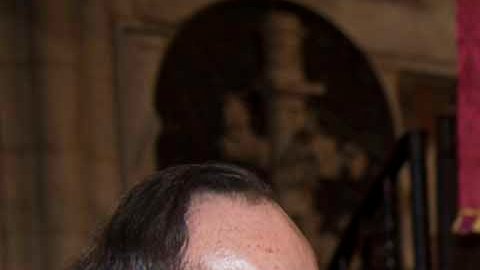 Dave Myers en una reunión con la reina consorte Camila