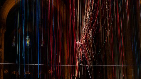 New York (United States), 02/02/2024.- French tightrope artist Philippe Petit performs during a single night performance called 'The Ribbon Walk' on a high wire amongst ribbons hung as part of the site-specific installation 'Divine Pathways' by artist Anne Patterson in the nave of the Cathedral of St. John the Divine in New York, New York, USA, 01 February 2024. (Nueva York) EFE/EPA/JUSTIN LANE