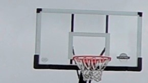 A Suffolk County Police car is stationed in the driveway of the home of Shoreham-Wading River High School junior Tom Cutinella, Thursday, Oct. 2, 2014, in Shoreham, N.Y. Authorities say Cutinella, a 16-year-old football player at the high school, died at a hospital the night before after suffering a head injury in an on-field collision during a game with John Glenn High School in Elwood, N.Y. (AP Photo/Kathy Kmonicek)