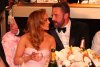 Ben Affleck y Jennifer López platicando.