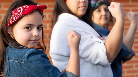 Several,Women,Of,Different,Generations,With,Their,Fist,Raised,In