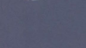 Rauw Alejandro y Rosalía posando.