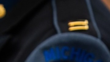 Exoficial de Michigan se declara culpable de abuso de la fuerza