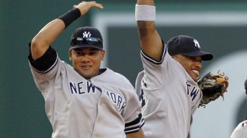 Melky Cabrera (L) y Robinson Canó (R) compartieron por cinco temporadas en New York Yankees.