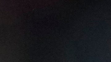 Kylian Mbappé sonríe durante un partido con el PSG en la Ligue 1.