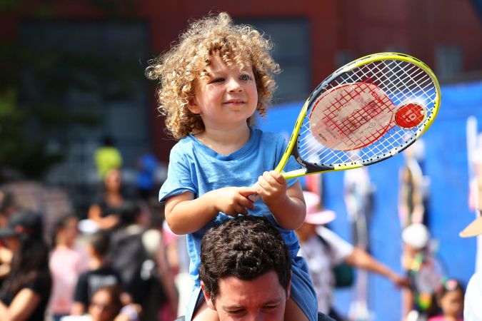 El Arthur Ashe Kids' Day se celebra el sábado previo al inicio de la competición del cuadro principal.