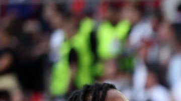 Jugadores franceses celebran el pase a cuartos de final tras haber vencido a Bélgica.