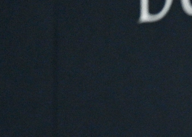 Ben Affleck y Jennifer López posando.