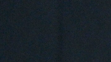 Ben Affleck y Jennifer López posando.