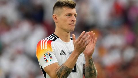 Germany's Toni Kroos clap hands as he acknowledges supporters at the end of a quarter final match between Germany and Spain at the Euro 2024 soccer tournament in Stuttgart, Germany, Friday, July 5, 2024. (AP Photo/Ariel Schalit)