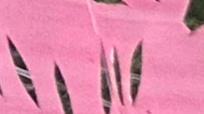 Isabel Perez and Javier Santos, owners of La Terraza Mexican Grill in Oxford, Conn., stand by their restaurant, Monday, Aug. 19, 2024, where the driveway washed away and the basement flooded when The Little River overflowed. (AP Photo/Dave Collins)