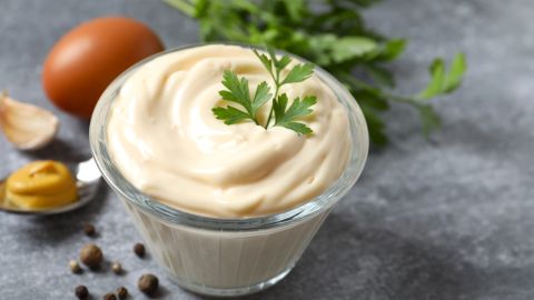 Bowl,With,Mayonnaise,And,Ingredients,For,Cooking,On,Gray,Background