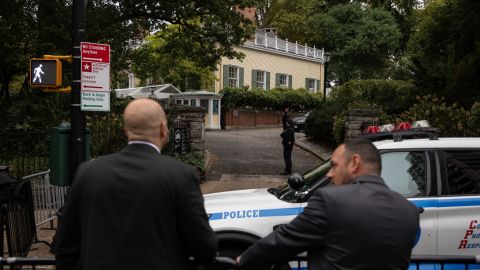 Police officers stand outside Gracie Mansion, the official residence of New York City Mayor Eric Adams, Thursday, Sep. 26, 2024, in New York. (AP Photo/Yuki Iwamura)