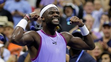 Tiafoe celebra su trabajada victoria ante Popyrin.