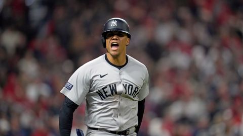 New York Yankees' Juan Soto celebrates after hitting a three-run home run against the Cleveland Guardians during the 10th inning in Game 5 of the baseball AL Championship Series Saturday, Oct. 19, 2024, in Cleveland. (AP Photo/Godofredo A. Vásquez)
