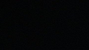 Liam Payne posando con una fanática.