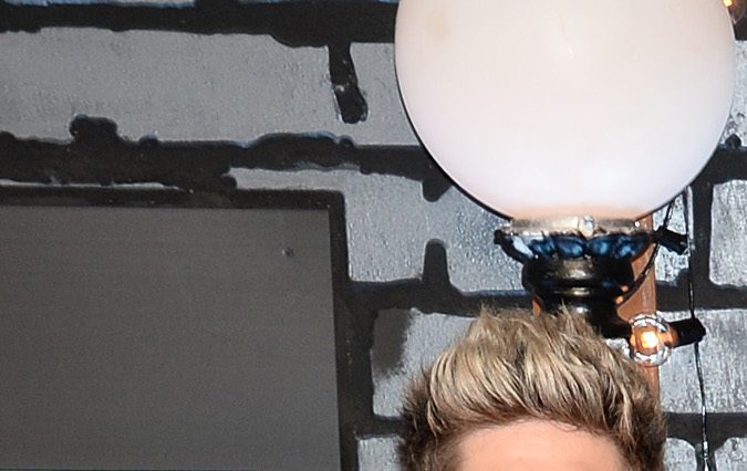 Miembros de One Direction posando.