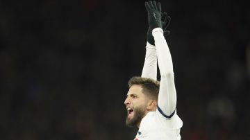 FILE - Tottenham's Rodrigo Bentancur celebrates after scoring his side's second goal during the English Premier League soccer match between Manchester United and Tottenham Hotspur at the Old Trafford stadium in Manchester, England, Jan. 14, 2024. Tottenham midfielder Rodrigo Bentancur has apologized to teammate Son Heung-min for making an offensive comment about South Koreans. Bentancur, who is in Uruguay's squad for the Copa America, posted an apology on his Instagram story late Friday June 14, 2024.(AP Photo/Dave Thompson, File)