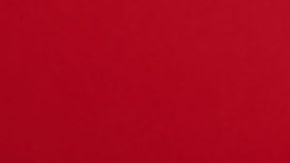 Krispy Kreme presentó una dona con la cara de Grinch rellena de crema.