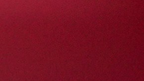 Una vela con el retrato del papa Francisco se ve frente al Policlínico Agostino Gemelli, en Roma, donde Francisco está hospitalizado.