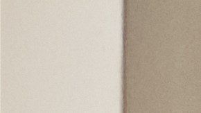 Middle eastern family sitting on stairs surrounded by moving boxes. Indian parents and their two daughters smiling on moving day. Mixed race family with daughters enjoy a moment of relax together during relocation.