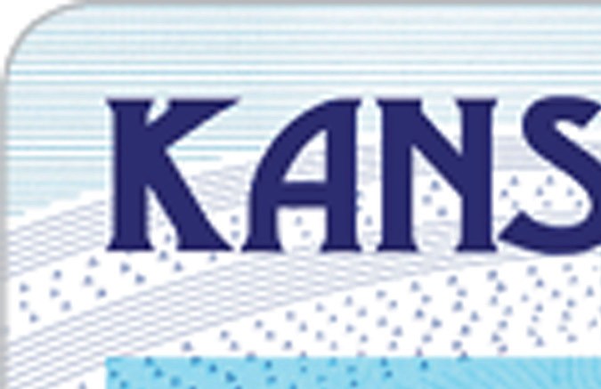 El diseño de la licencia de conducir de Kansas cumple con los requisitos federales de identificación para fines de seguridad aeroportuaria de la Ley Real ID.
