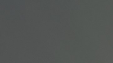 Silhouette,Of,Spiritual,Pigeon,Bird,Flying,Over,The,Sea,With