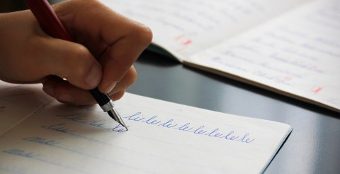 Detail,Of,A,Child's,Left,Hand,Writing,The,Syllables,Li