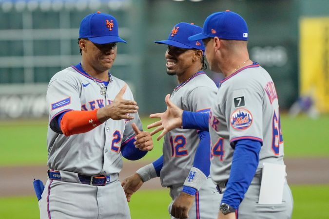 Juan Soto y su manager Carlos Mendoza.
