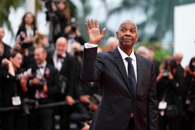 Denzel Washington asistió a Cannes para la premier mundial de su nueva película, Highest 2 Lowest junto con el director Spike Lee.
