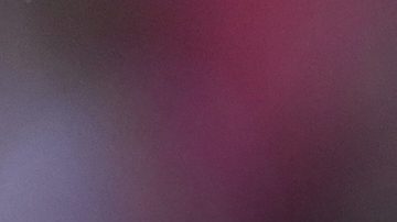 Facundo Colidio (R) sonríe durante un encuentro ante Boca Juniors.