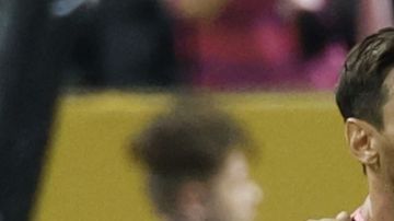 Messi y Vitinha.