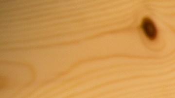 Todo el acabado mantiene una estética de madera clara natural, con estilo de casa de campo moderna.