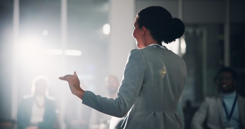 Woman,,Speaker,And,Audience,At,Convention,,Stage,Or,Discussion,With