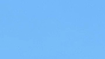 Aficiondados al tenis ingresan al estadio en Flushing.